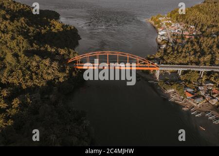 Aerial Shot of a Modern Bridge in an Island Village in the Philippines Stock Photo