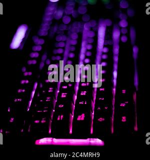 Closeup shot of a colorful light gaming back-lit keyboard - perfect for gaming and typing Stock Photo