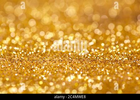 Golden giltter texture christmas abstract background. Gold bokeh abstract background. Stock Photo