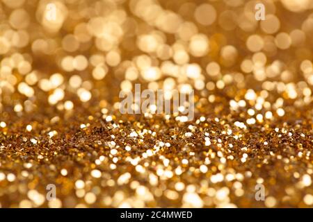 Golden giltter texture christmas abstract background. Gold bokeh abstract background. Stock Photo