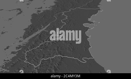 Zoom in on Chumphon (province of Thailand) outlined. Oblique perspective. Bilevel elevation map with surface waters. 3D rendering Stock Photo