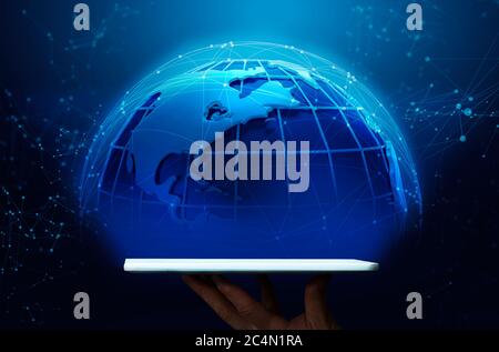 Male hand holding tablet computer with emerging planet surrounded by global network, collage. Panorama Stock Photo
