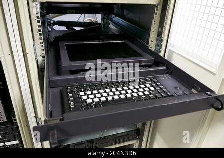 Rack mounted management console of enterprise server. Server management console with tft screen in datacenter. Stock Photo
