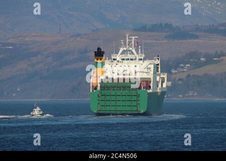 MV Hurst Point, a Point-class sealift ship operated by Foreland Shipping for the Ministry of Defence, taking on a pilot from Serco's SD Clyde Racer. Stock Photo