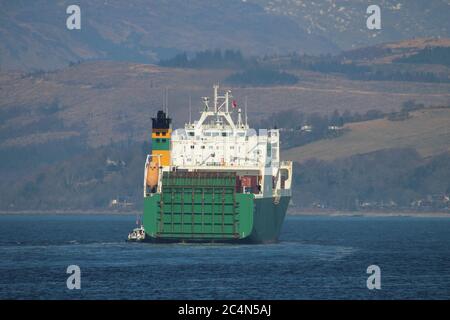 MV Hurst Point, a Point-class sealift ship operated by Foreland Shipping for the Ministry of Defence, taking on a pilot from Serco's SD Clyde Racer. Stock Photo