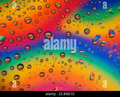 Abstract illustration of water droplets on a colorful glass surface Stock Photo