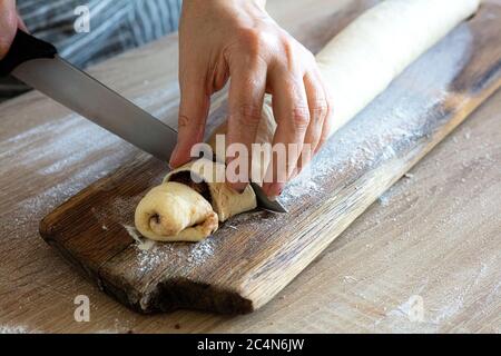 process of making yeast dough sweet rolls Stock Photo