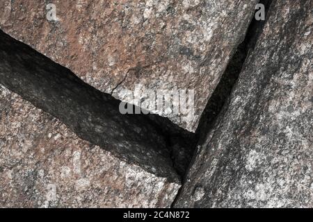 One precise sharp crack on bedrock surface , Finland Stock Photo