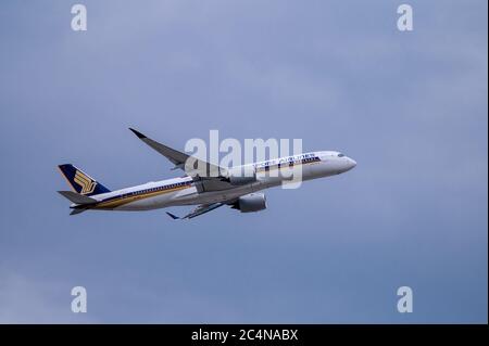 Singapore Airlines Airbus A350-900 passenger aircraft registration 9V-SMY shortly after take off from Frankfurt am Main airport Stock Photo