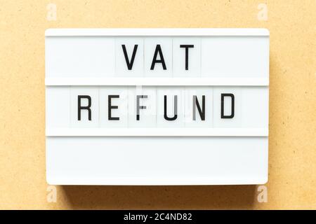 Lightbox with word vat refund on wood background Stock Photo