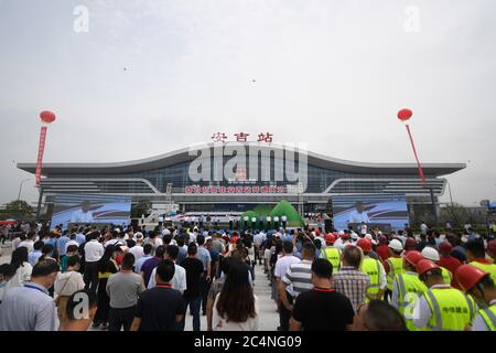 Hangzhou, China's Zhejiang Province. 28th June, 2020. People participate in an initiation ceremony for Anji Railway Station, one of the stops on the Shangqiu-Hefei-Hangzhou high-speed railway, in Anji County, east China's Zhejiang Province, June 28, 2020. A new high-speed railway route connecting east and central China started operation on Sunday. With a designed speed of 350 kph, the route connects the city of Shangqiu in central China's Henan Province, and Hefei and Hangzhou, the capital cities of east China's Anhui and Zhejiang provinces. Credit: Huang Zongzhi/Xinhua/Alamy Live News Stock Photo