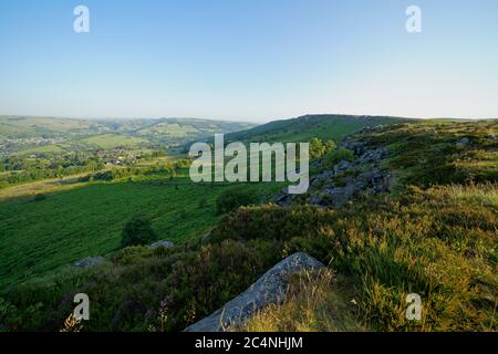 Looking from Baslow Edge across to Curbar Edge on a bright, hazy summer morning