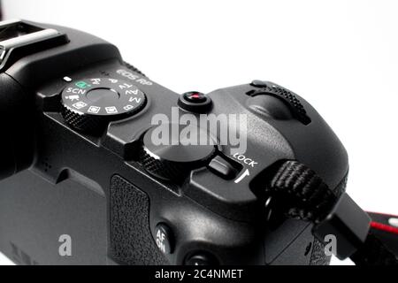 Schiedam, The Netherlands - NOV 23, 2019: Closeup of the control buttons of the new Canon EOS RP full frame mirrorless camera body on a white backgrou Stock Photo