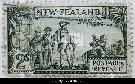 Captain Cook landing at Poverty Bay, New Zealand, on New Zealand postage stamp issued in 1935 Stock Photo