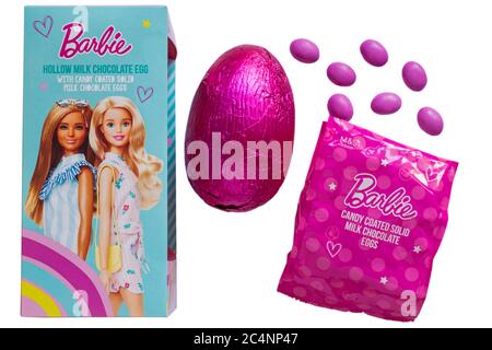 M&S Barbie hollow milk chocolate Easter egg with candy coated solid milk chocolate eggs isolated on white background - Milk Chocolate Hollow Egg Stock Photo