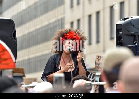 London, UK. 27th June, 2020. An activist addresses the crowds at the Black Trans Lives Matters' march in London.Thousands of activists have marched through London in support of the Black Trans Lives Matter movement in place of Pride celebrations. Credit: SOPA Images Limited/Alamy Live News Stock Photo