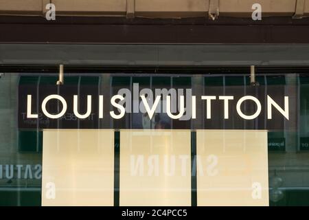 Munich, Germany : Louis Vuitton logo. Louis Vuitton Malletier is a french fashion house founded in 1854, today belonging to LVMH group. Stock Photo
