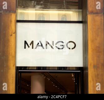 Munich, Germany : Mango shop. MANGO, is a clothing design and manufacturing company, founded in Barcelona, Spain. Stock Photo