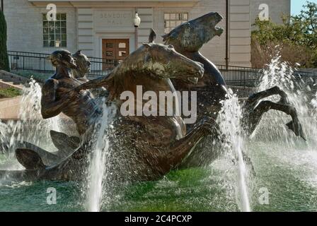 Sea-horses mounted by merman at Littlefield Fountain, World War I memorial, by sculptor Pompeo Coppini, Main Campus, University of Texas, Austin Texas Stock Photo