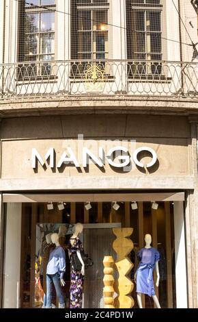 Munich, Germany : Mango shop. MANGO, is a clothing design and manufacturing company, founded in Barcelona, Spain. Stock Photo