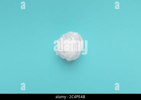 Masking duct tape ball on blue background Stock Photo