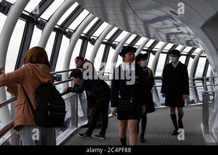 People at Tokyo Skytree Tower Observation Deck - also known as 'Tembo Gallery' starting at the 445th floor. Tokyo, Japan. Stock Photo