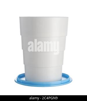 Folding plastic white cup isolated on white. Front wiew. Stock Photo
