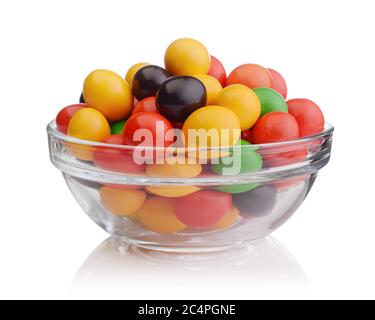 Multi-colored sweets in a glass bowl isolated on white. Front view. Stock Photo