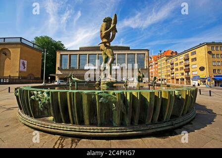 Statue of Poseidon (by Carl Milles) and the Concert Hall (Konserthuset) in the back, Gothemburg, Sweden Stock Photo
