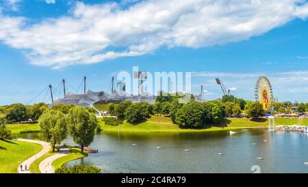 Olympiapark in summer, Munich, Germany. Scenic view of Olympic stadium and lake. Panorama of famous Munich sport area. Urban landscape with nice amuse Stock Photo