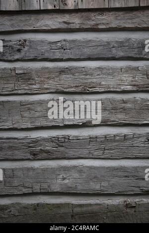Weathered wood texture from the exterior of an old building Stock Photo