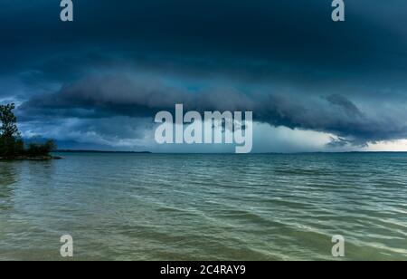 Chieming, Germany. 28th June, 2020. A thunderstorm front moves over the Chiemsee. Credit: Bernd März/dpa/Alamy Live News Stock Photo