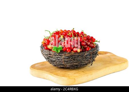 Fresh redcurrants in a bowl isolated on white background Stock Photo