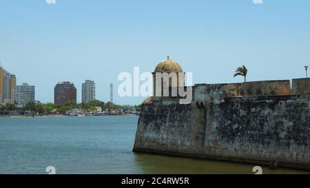 Cartagena de Indias, Bolivar / Colombia - April 9 2016: View of the walled city with modern buildings in the background. Cartagena's colonial walled c Stock Photo