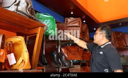 fashion products made from high-quality cow leather from the work of traditional craftsmen in Batang, Indonesia, 27 June 2020 Stock Photo
