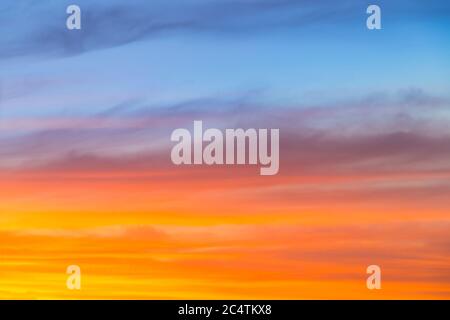 Amazing blue, orange and yellow colors sunset sky gradient background Stock Photo