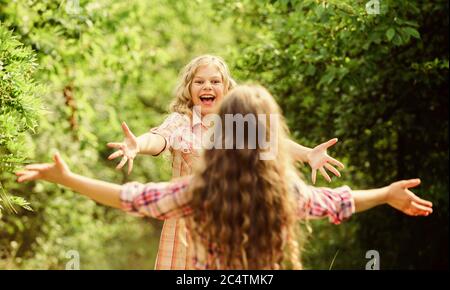 My dear friend. Happy girls excited see each other. Give me hug. Glad to meet you. Finally together. Happy reunion concept. Best friends forever. Happy kids running meet each other. Sincere emotions. Stock Photo