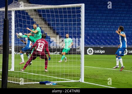 Barcelona, Spain. 28th June, 2020. Real Madrid's Karin Benzema (2nd L) shoots during a Spanish league football match between RCD Espanyol and Real Madrid in Barcelona, Spain, June 28, 2020. Credit: Joan Gosa/Xinhua/Alamy Live News Stock Photo
