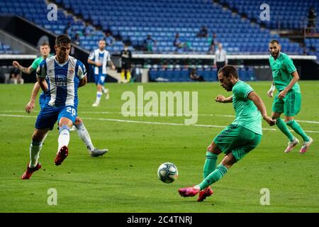 Barcelona, Spain. 28th June, 2020. Real Madrid's Eden Hazard (2nd R) passes the ball during a Spanish league football match between RCD Espanyol and Real Madrid in Barcelona, Spain, June 28, 2020. Credit: Joan Gosa/Xinhua/Alamy Live News Stock Photo