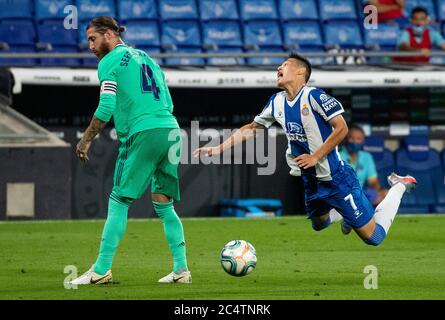 Barcelona, Spain. 28th June, 2020. RCD Espanyol's Wu Lei (R) competes during a Spanish league football match between RCD Espanyol and Real Madrid in Barcelona, Spain, June 28, 2020. Credit: Joan Gosa/Xinhua/Alamy Live News Stock Photo