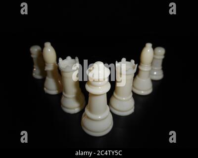 Chess photographed on portrait of black background. Stock Photo