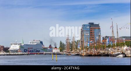 Cruiseship and sailboats at the quay in Kiel, Germany Stock Photo