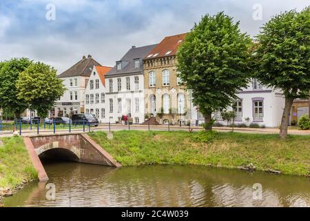 Historic houses and bridge at the canal in Friedrichstadt, Germany Stock Photo