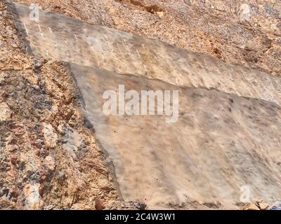 Strengthening of the quarry slopes with shotcrete. Stock Photo