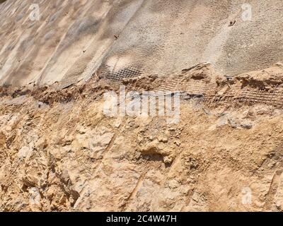 Strengthening of the quarry slopes with shotcrete. Stock Photo