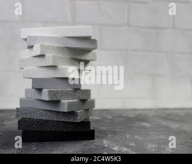 Luxury marble natural stone slabs for kitchen countertops and floor tiles. Samples of stone for countertops. Stock Photo