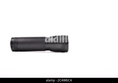 Black flashlight isolated on a white background Stock Photo