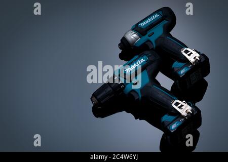 CHONBURI, THAILAND-MAY 24, 2020 : Makita codless driver drill isolated on dark background. Makita tools. Single sleeve keyless driver drill chuck. Stock Photo