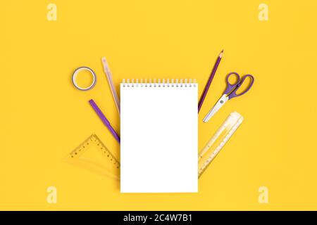 Download Notepad Mockup With Stationery On A Bright Yellow Background Back To School Concept With Copy Space Stock Photo Alamy PSD Mockup Templates