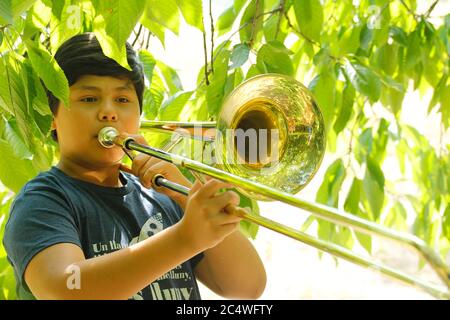 Playing the trombone, Stock Photo